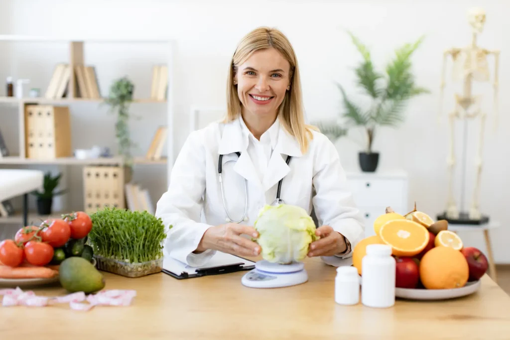 female nutritionist sitting at table in clinic and 2024 12 13 08 27 33 utc